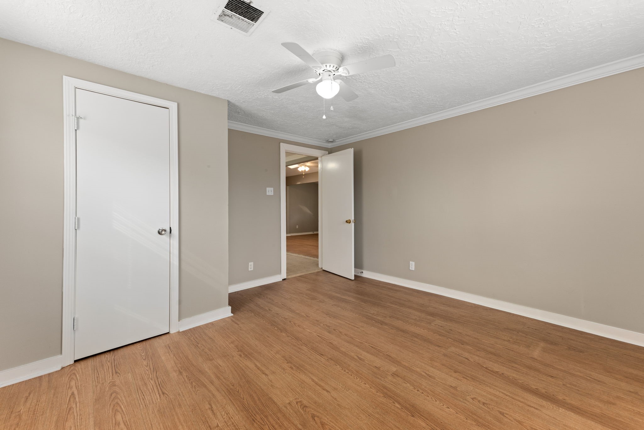 5311 Gano Street Houston, TX 77009 - Photo 18 of 35 a view of an empty room with wooden floor