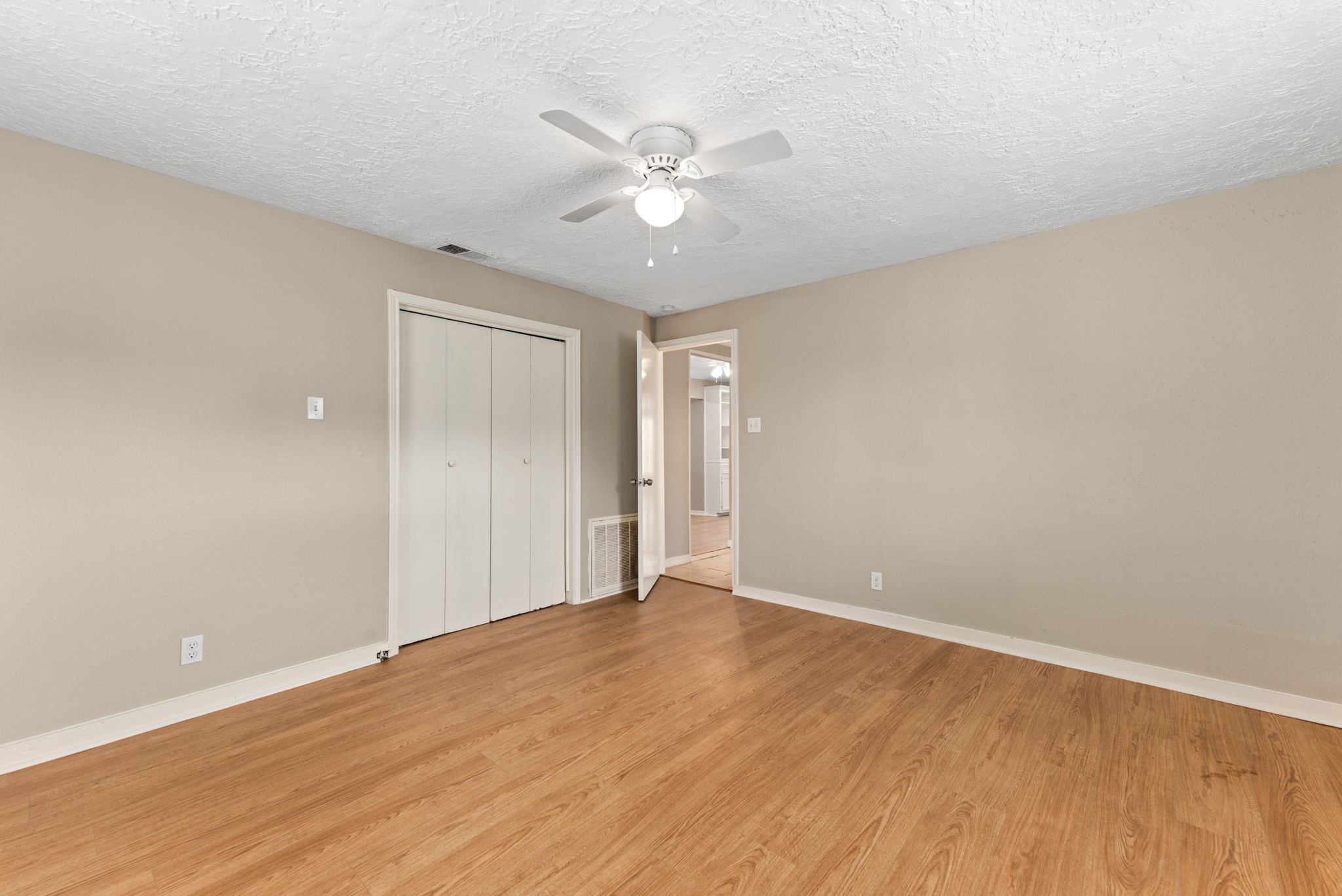5311 Gano Street Houston, TX 77009 - Photo 23 of 35 a view of an empty room with wooden floor