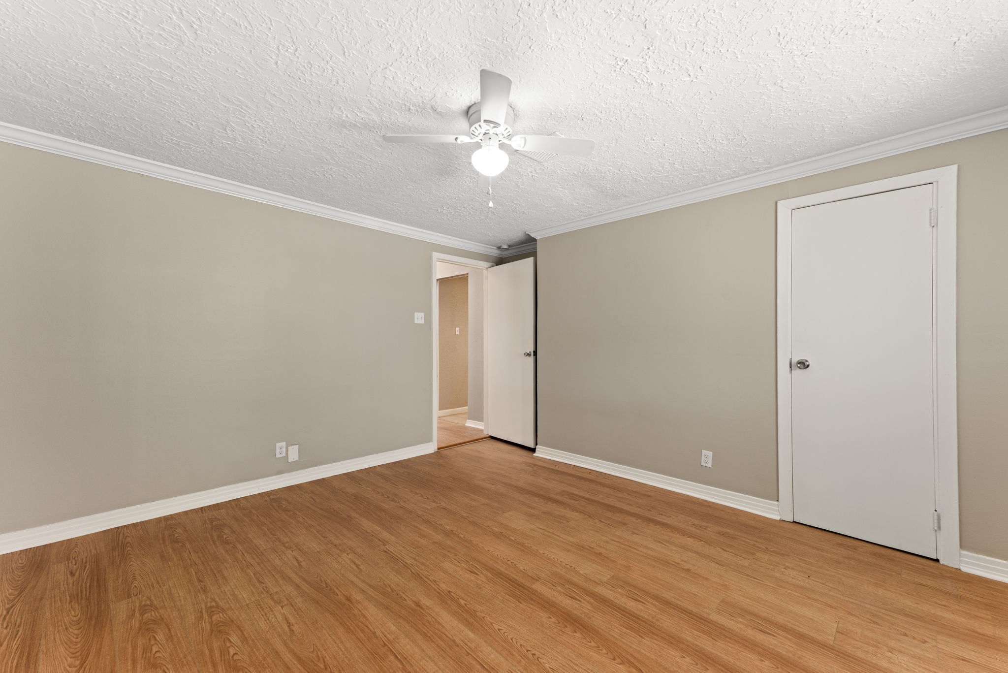 5311 Gano Street Houston, TX 77009 - Photo 27 of 35 a view of an empty room with wooden floor