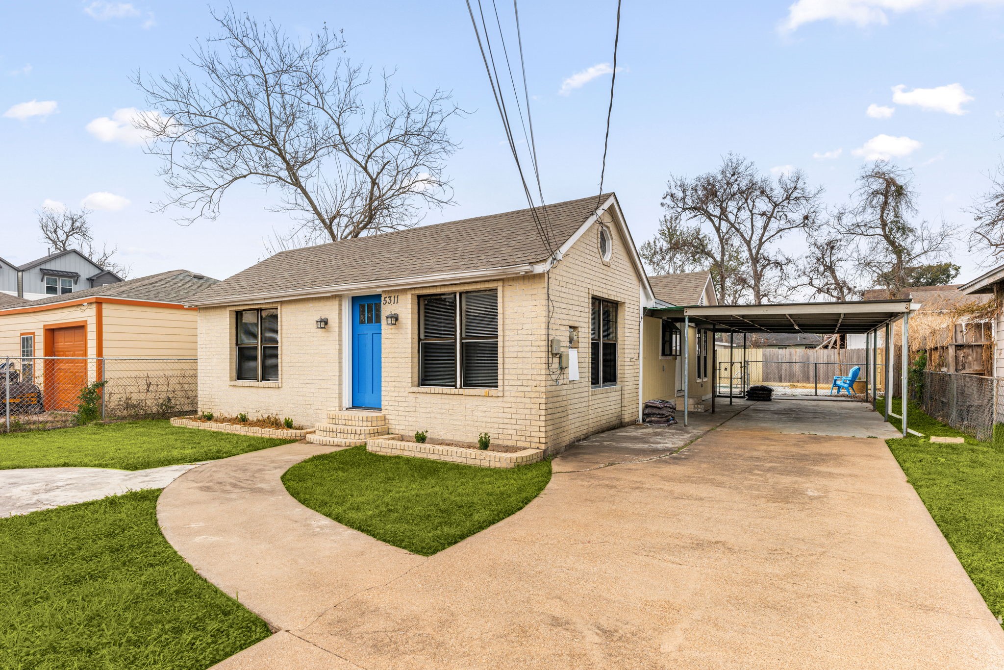 5311 Gano Street Houston, TX 77009 - Photo 5 of 35 a front view of a house with a yard and porch