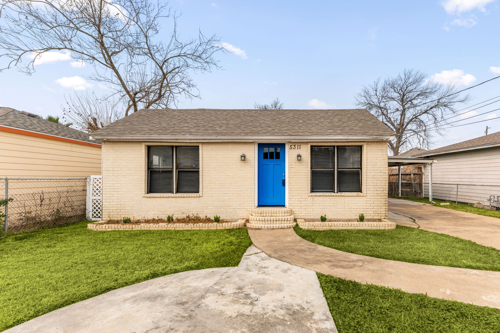 5311 Gano Street Houston, TX 77009 - Photo 7 of 35 a front view of a house with a garden and plants