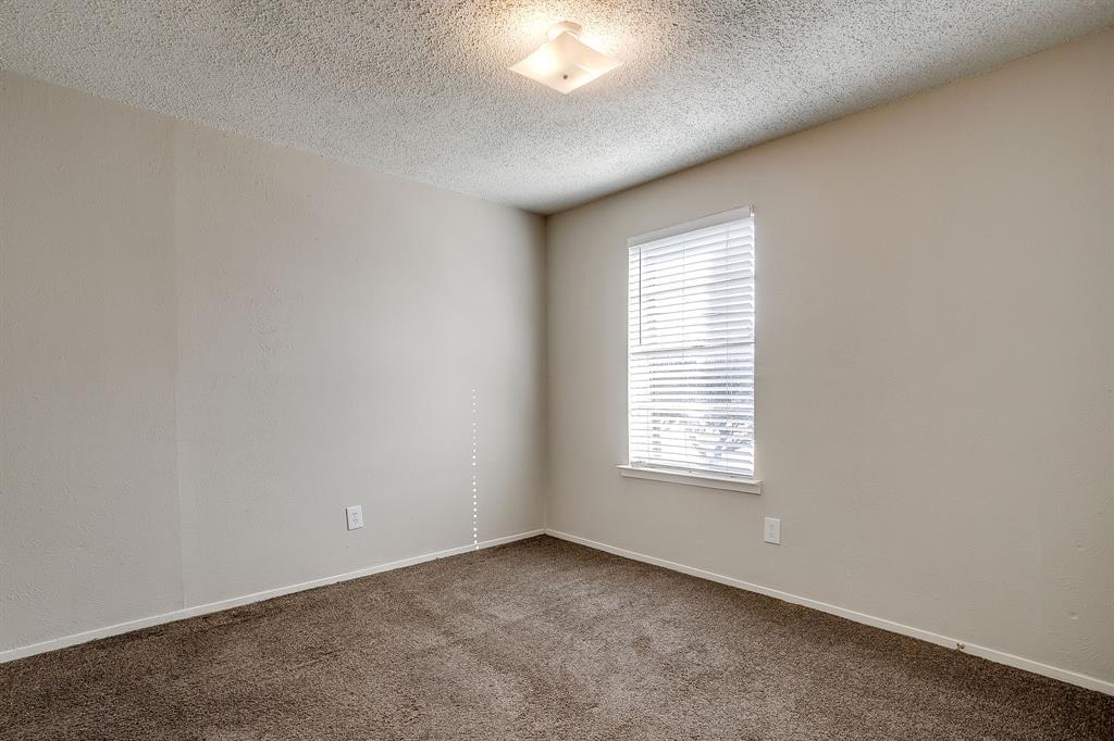 3400 Sanguinet Street, Unit RIGHT Fort Worth, TX 76107 - Photo 18 of 22 an empty room with a window