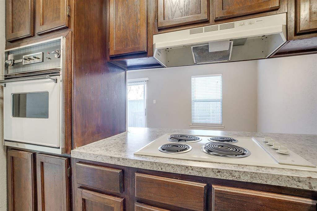 3400 Sanguinet Street, Unit RIGHT Fort Worth, TX 76107 - Photo 6 of 22 a kitchen with a stove and a sink