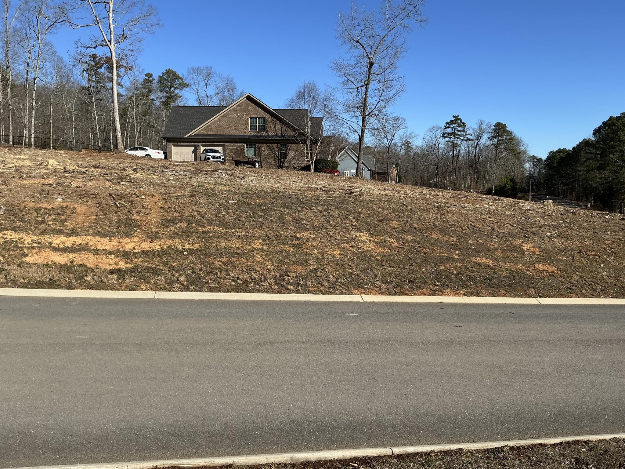 0 Frontage Road Northwest Cleveland, TN 37312 - Photo 6 of 8 a front view of a house with a yard