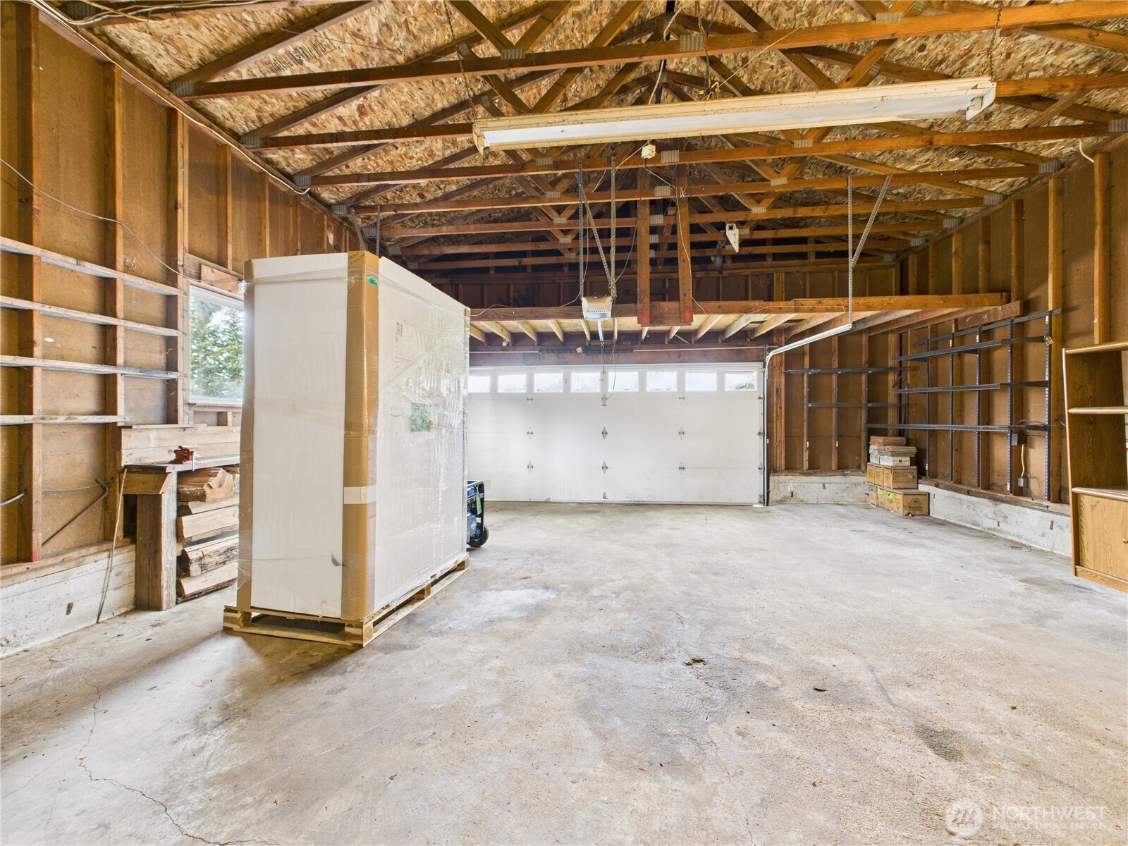 20925 260th Avenue Southeast Maple Valley, WA 98038 - Photo 16 of 34 a view of a room with wooden walls