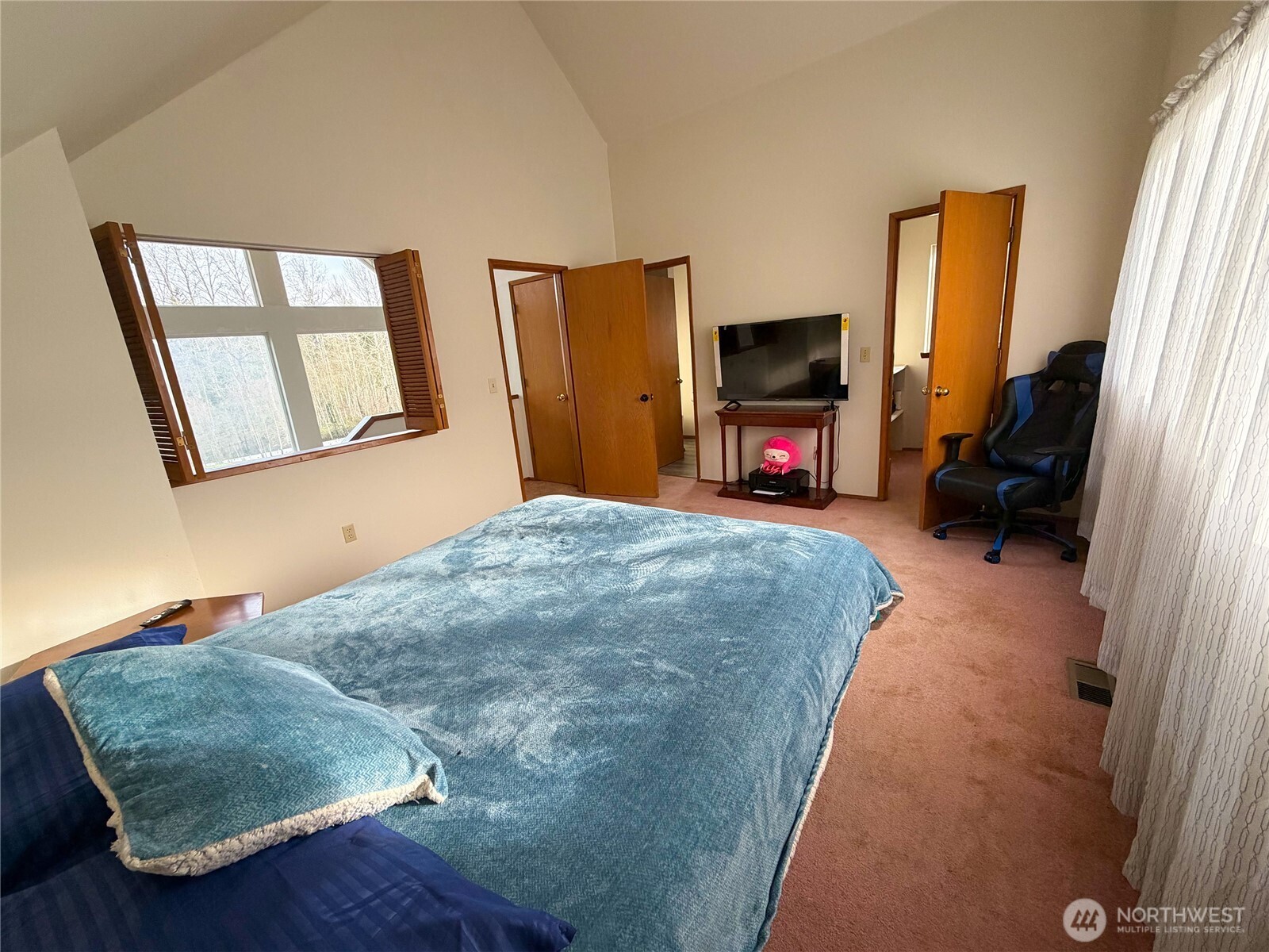 20925 260th Avenue Southeast Maple Valley, WA 98038 - Photo 28 of 34 a bedroom with a bed and a fireplace