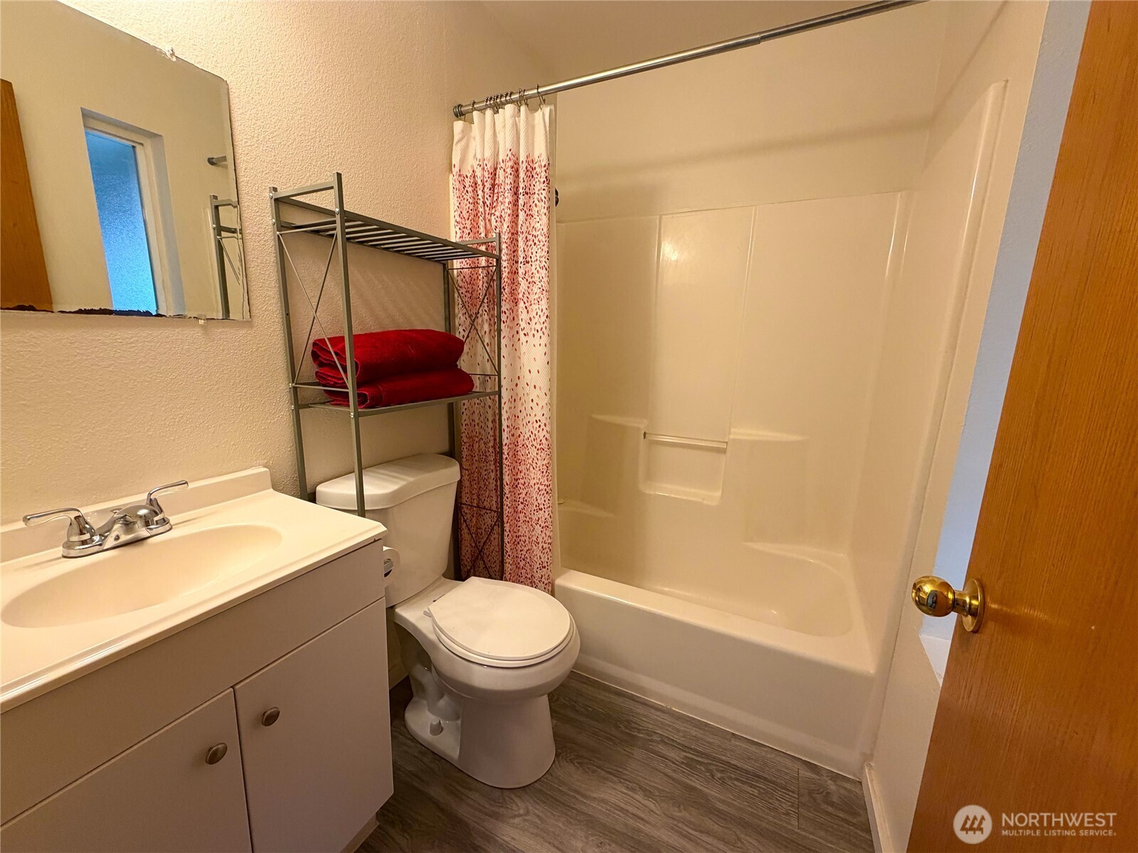 20925 260th Avenue Southeast Maple Valley, WA 98038 - Photo 31 of 34 a bathroom with a sink toilet and shower