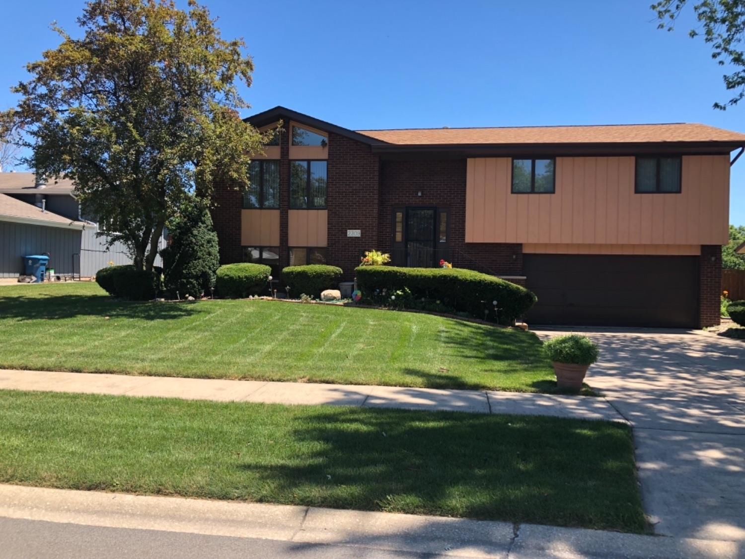 2309 Boulder Road Dyer, IN 46311 - Photo 1 of 24 a front view of a house with a yard