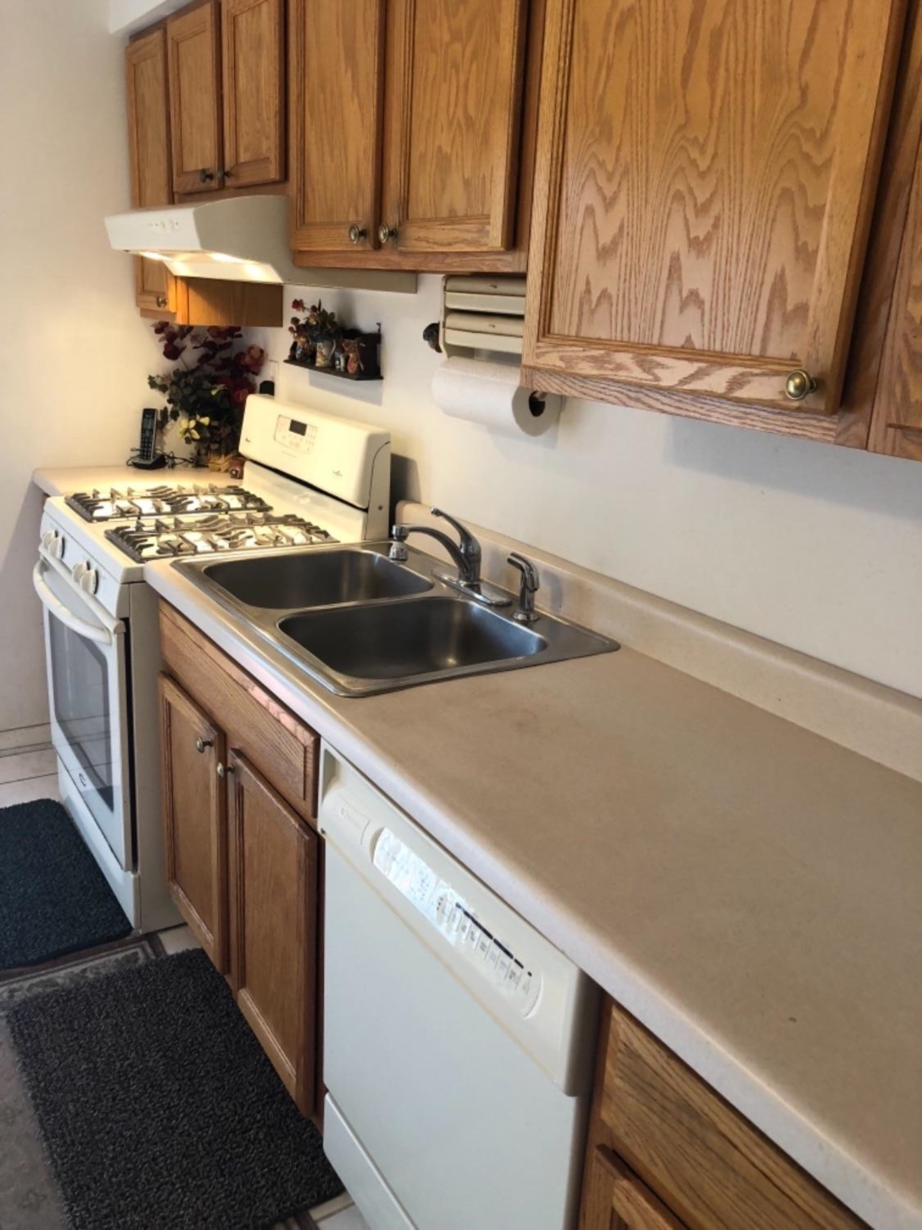 2309 Boulder Road Dyer, IN 46311 - Photo 9 of 24 a kitchen with a sink stove and cabinets