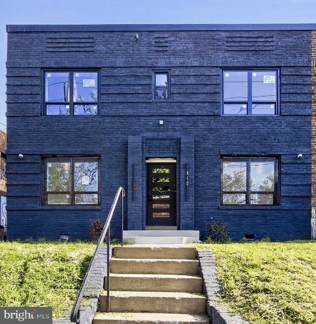 412 Newcomb Street Southeast Washington, DC 20032 - Photo 1 of 34 a front view of a house