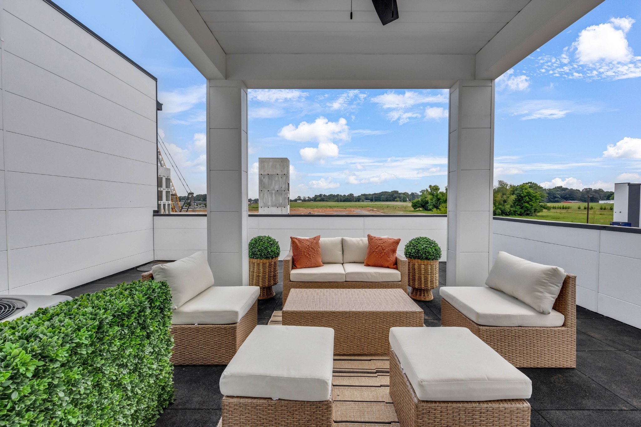 2411 Pea Ridge Road Clarksville, TN 37040 - Photo 16 of 25 a roof deck with couches and potted plants