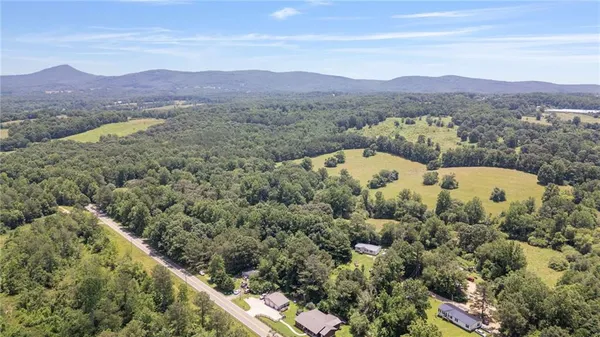 a view of a house with a mountain