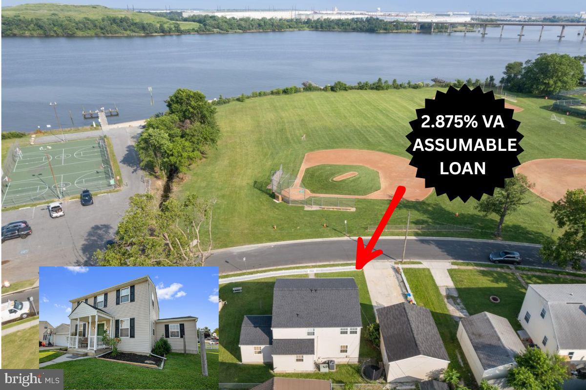 8255 Longpoint Road Baltimore, MD 21222 - Photo 1 of 54 an aerial view of a house with outdoor space and lake view