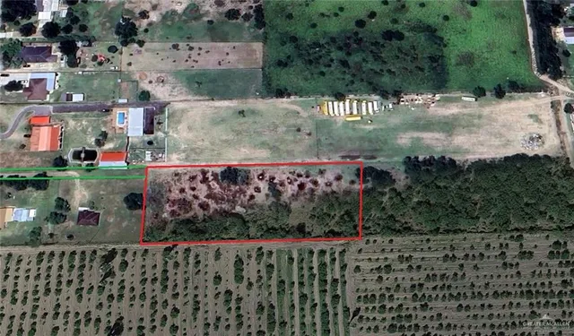 an outdoor space with wooden fence