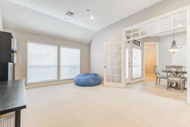 a workspace with furniture and window