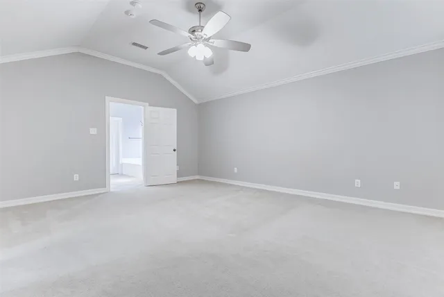 a spacious bathroom with a granite countertop sink a mirror and a vanity