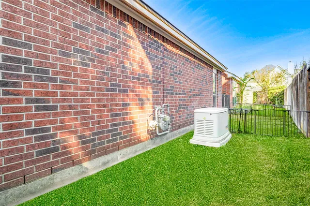 a view of a building with backyard