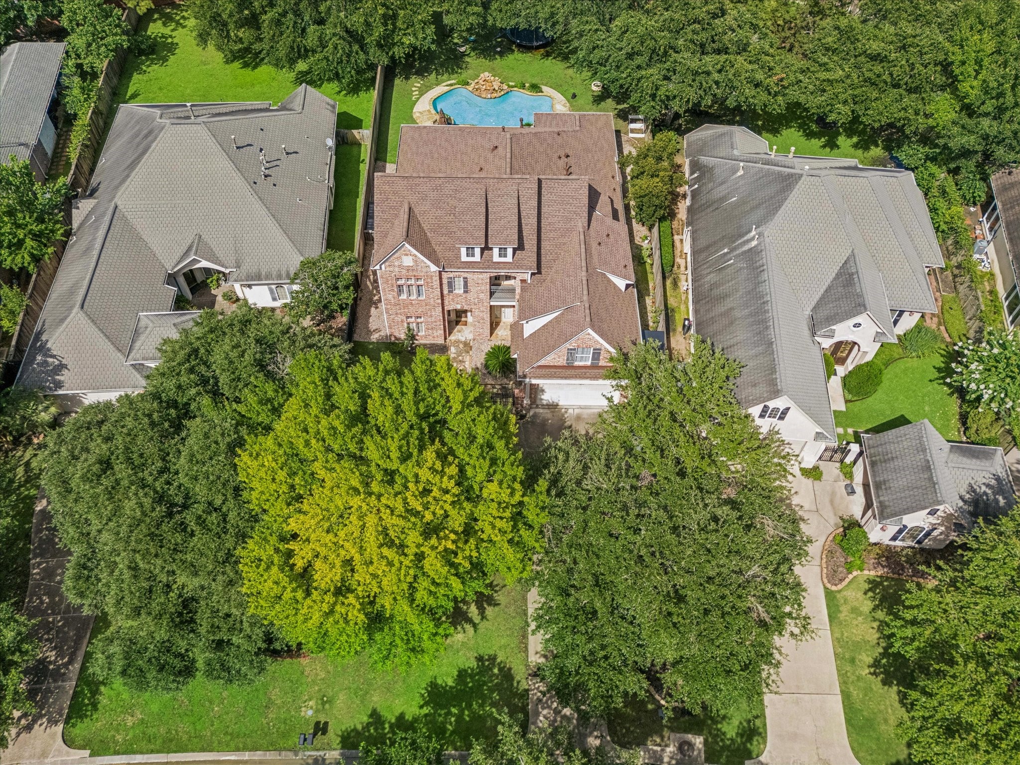 3047 Bonnebridge Way Boulevard Houston, TX 77082 - Photo 48 of 50 Fabulous aerial view of this stunning property. This home offers everything you could desire, featuring a sparkling pool, a backup generator, two versatile casitas perfect for work-flex spaces, and much more.