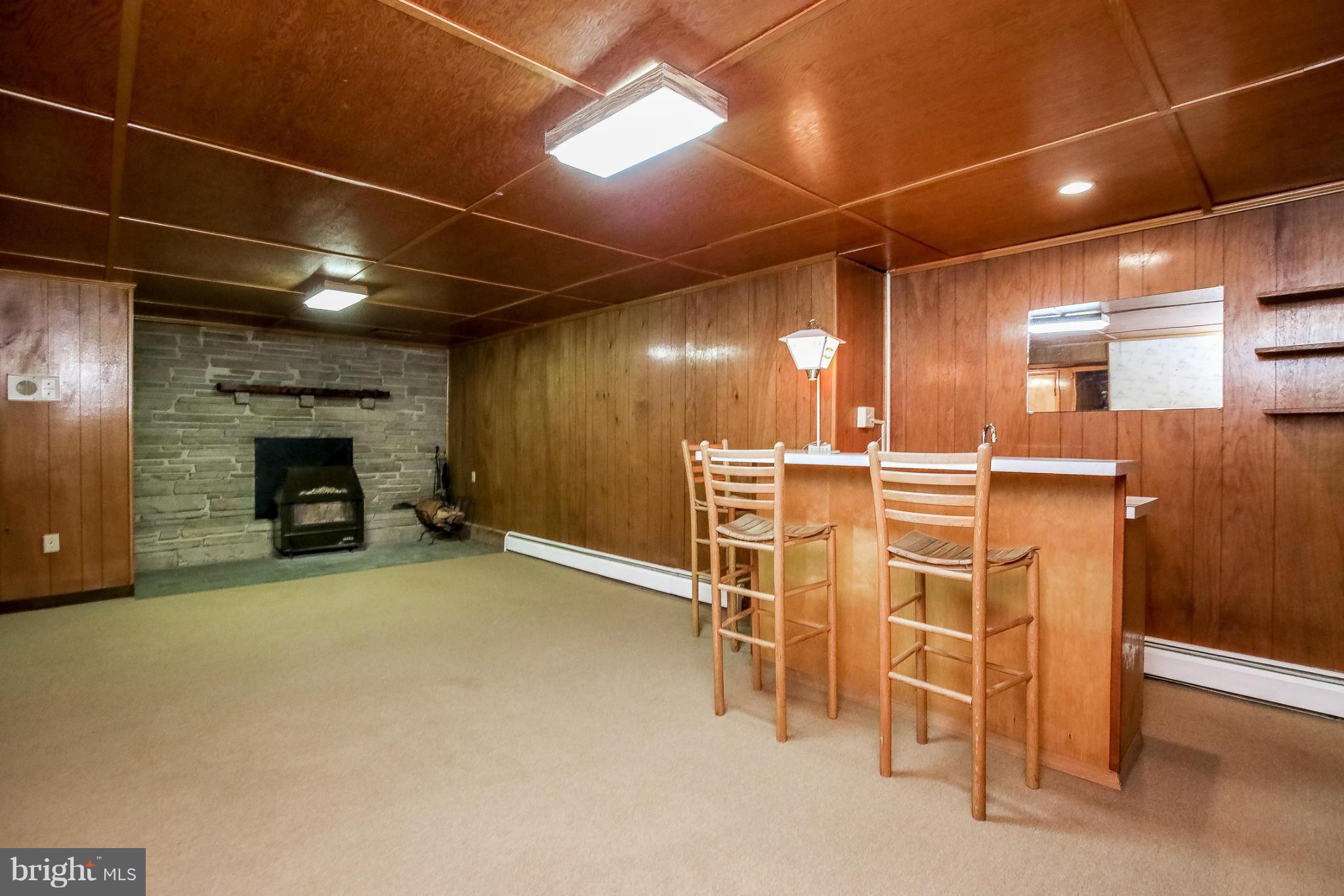 3430 Old Hanover Road Westminster, MD 21158 - Photo 14 of 28 Finished with wet bar and wood fireplace