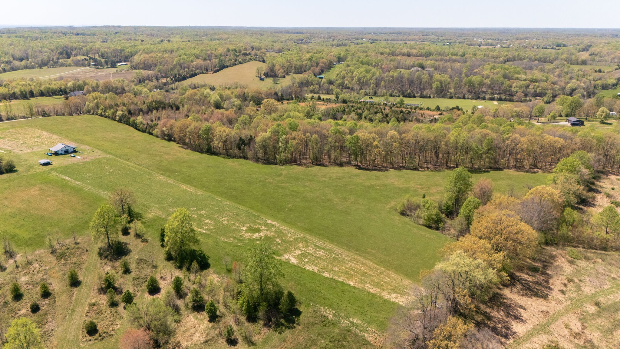 1037 Smith Thompson Road Bethpage, TN 37022 - Photo 16 of 19 a view of a lake with a mountain