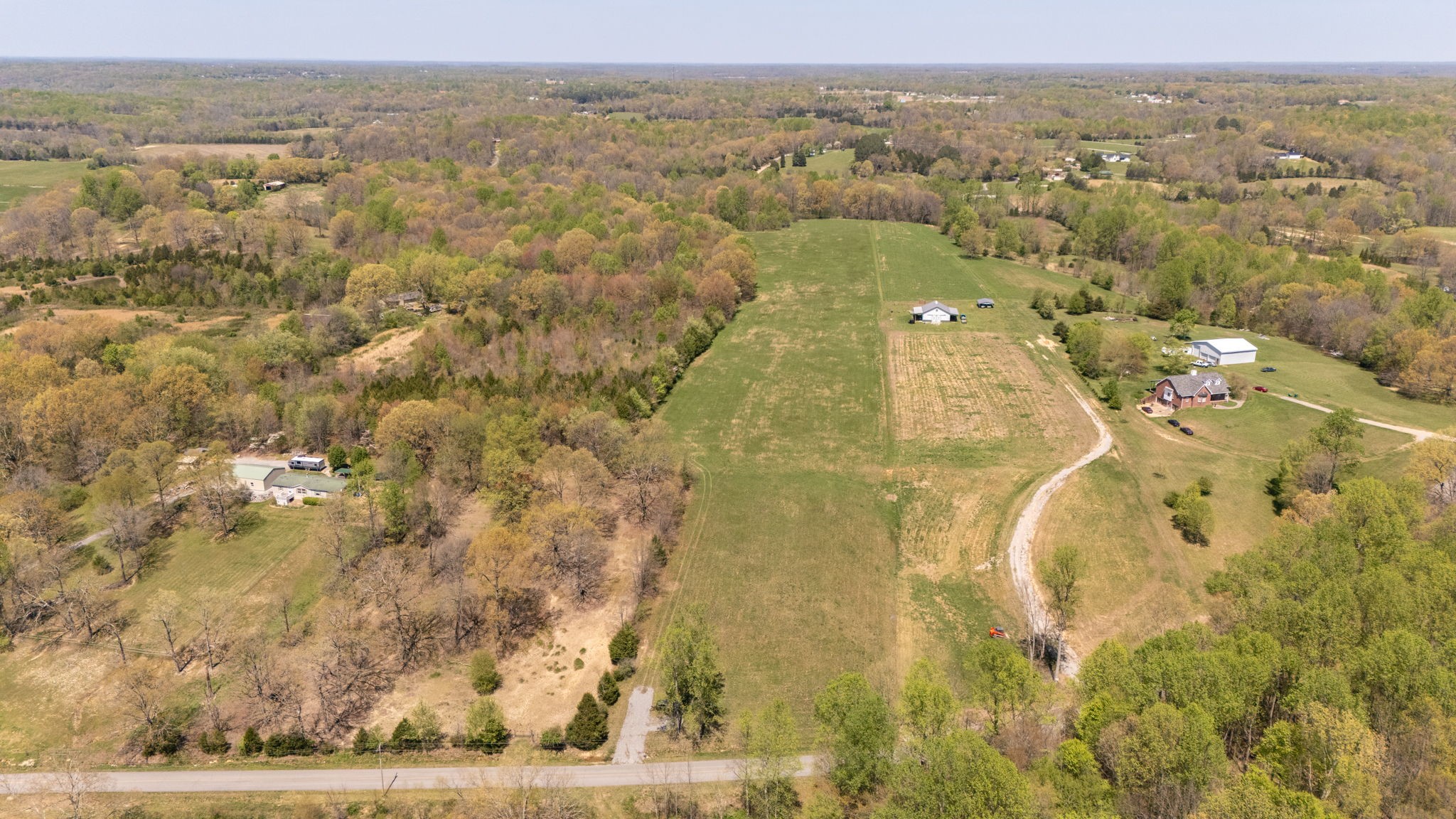 1037 Smith Thompson Road Bethpage, TN 37022 - Photo 17 of 19 an aerial view of residential houses with outdoor space