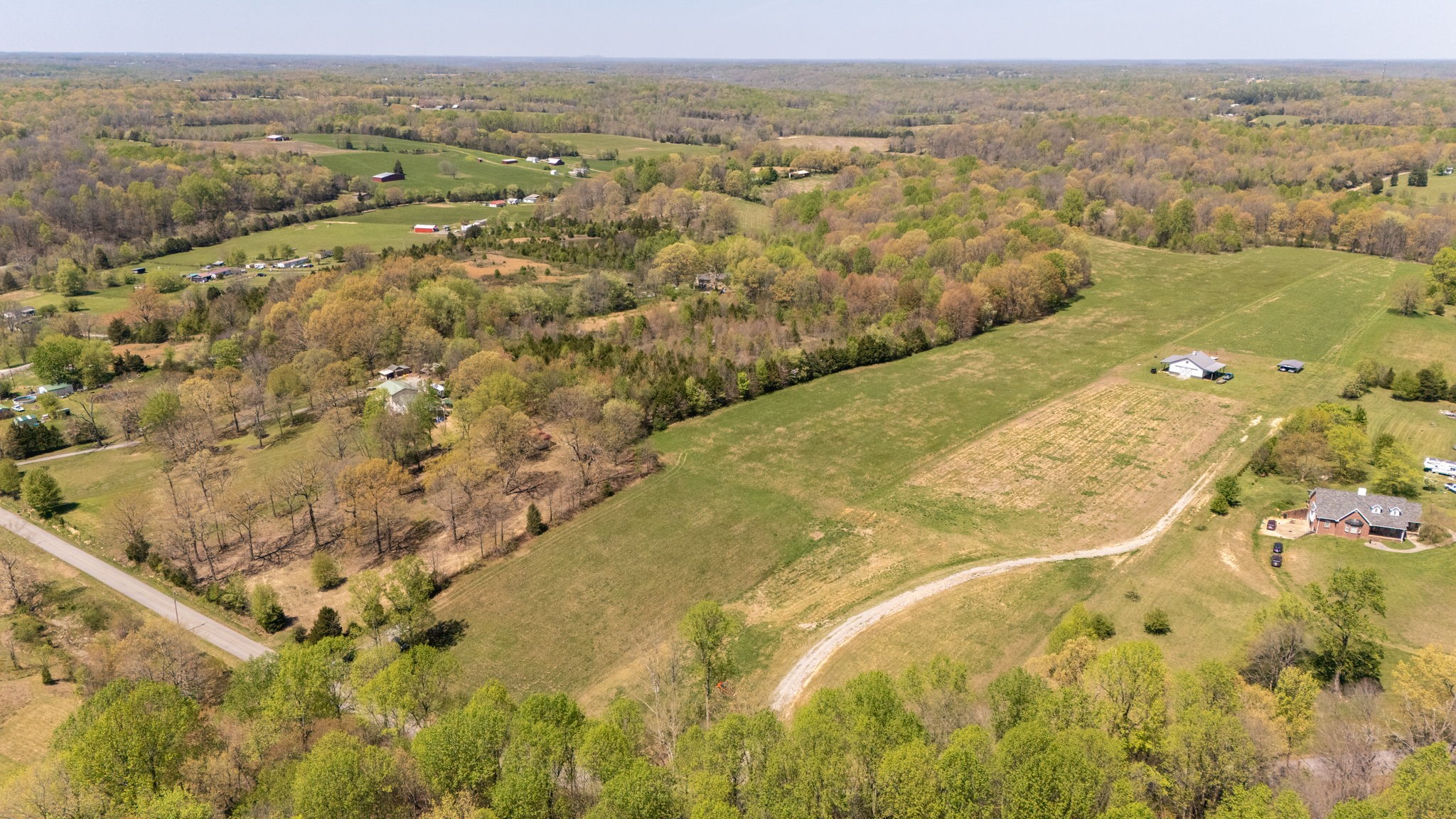 1037 Smith Thompson Road Bethpage, TN 37022 - Photo 3 of 19 an aerial view of residential houses with outdoor space