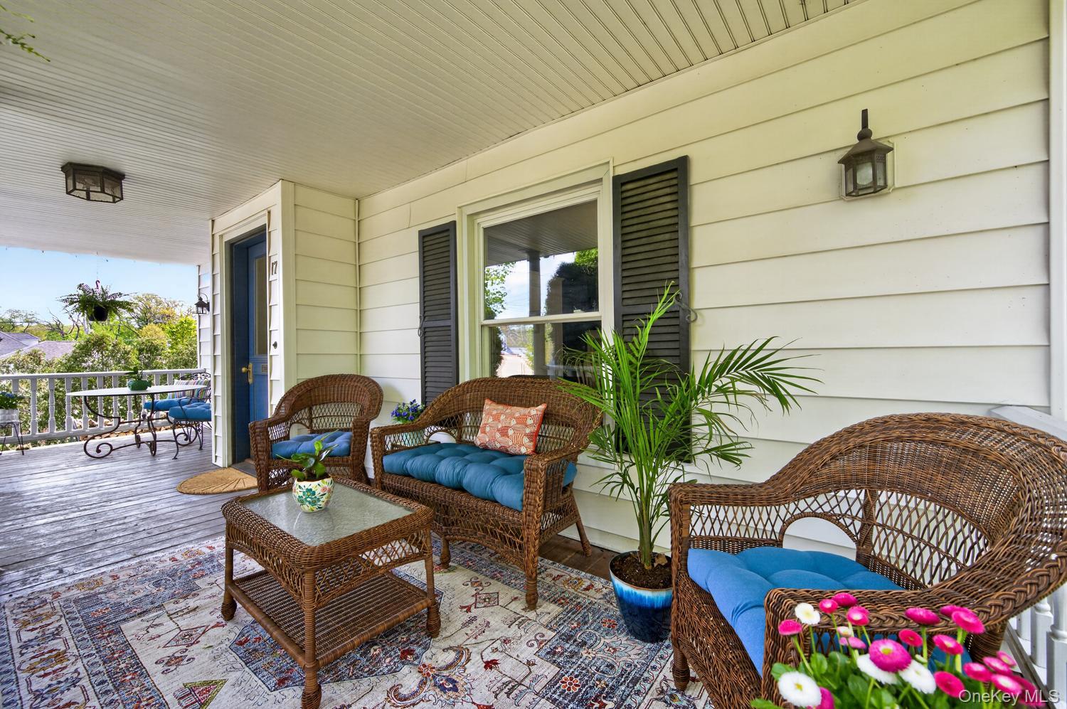 17 Riggs Place Locust Valley, NY 11560 - Photo 4 of 25 Front porch which spans across the front of the home