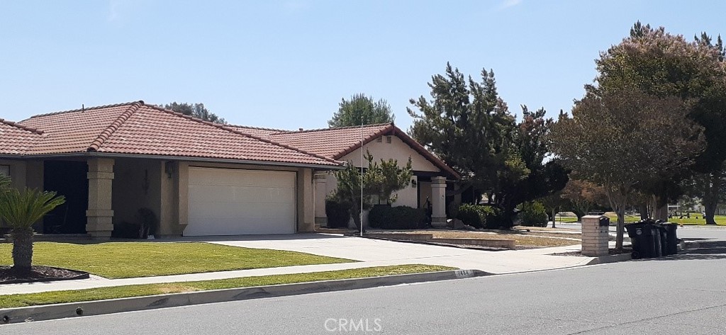 1484 Pepper Tree Drive Hemet, CA 92545 - Photo 3 of 29 Right Side Street View with Flag Pole