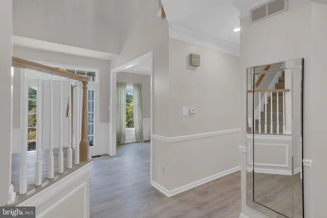 a bathroom with a granite countertop sink mirror and a bathtub