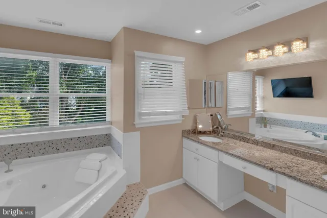 a room with furniture and a flat screen tv