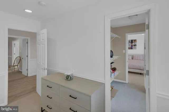 a view of a chairs and table in backyard