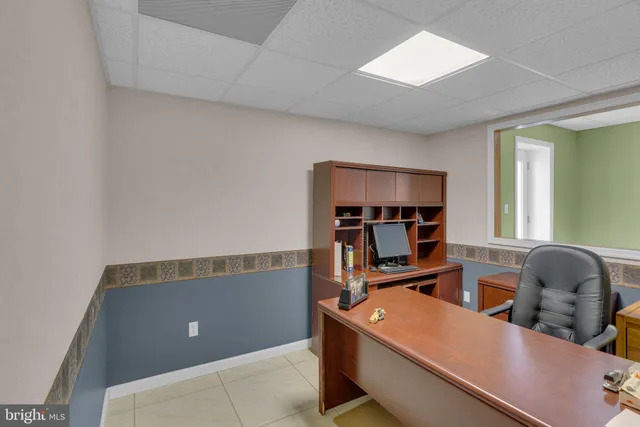 a view of a yard with swimming pool