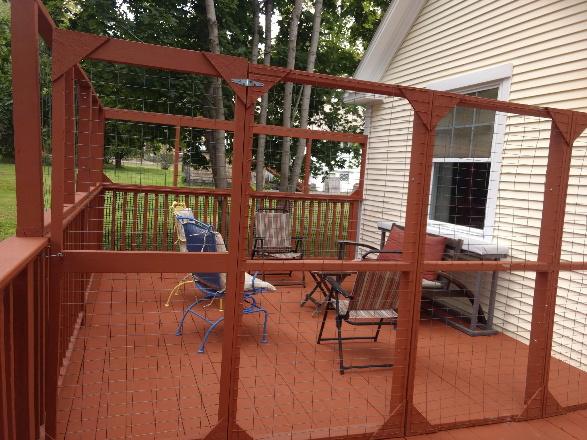 114 Spring Street Gardiner, ME 04345 - Photo 17 of 24 114 Spring St Deck with Kitty enclosure