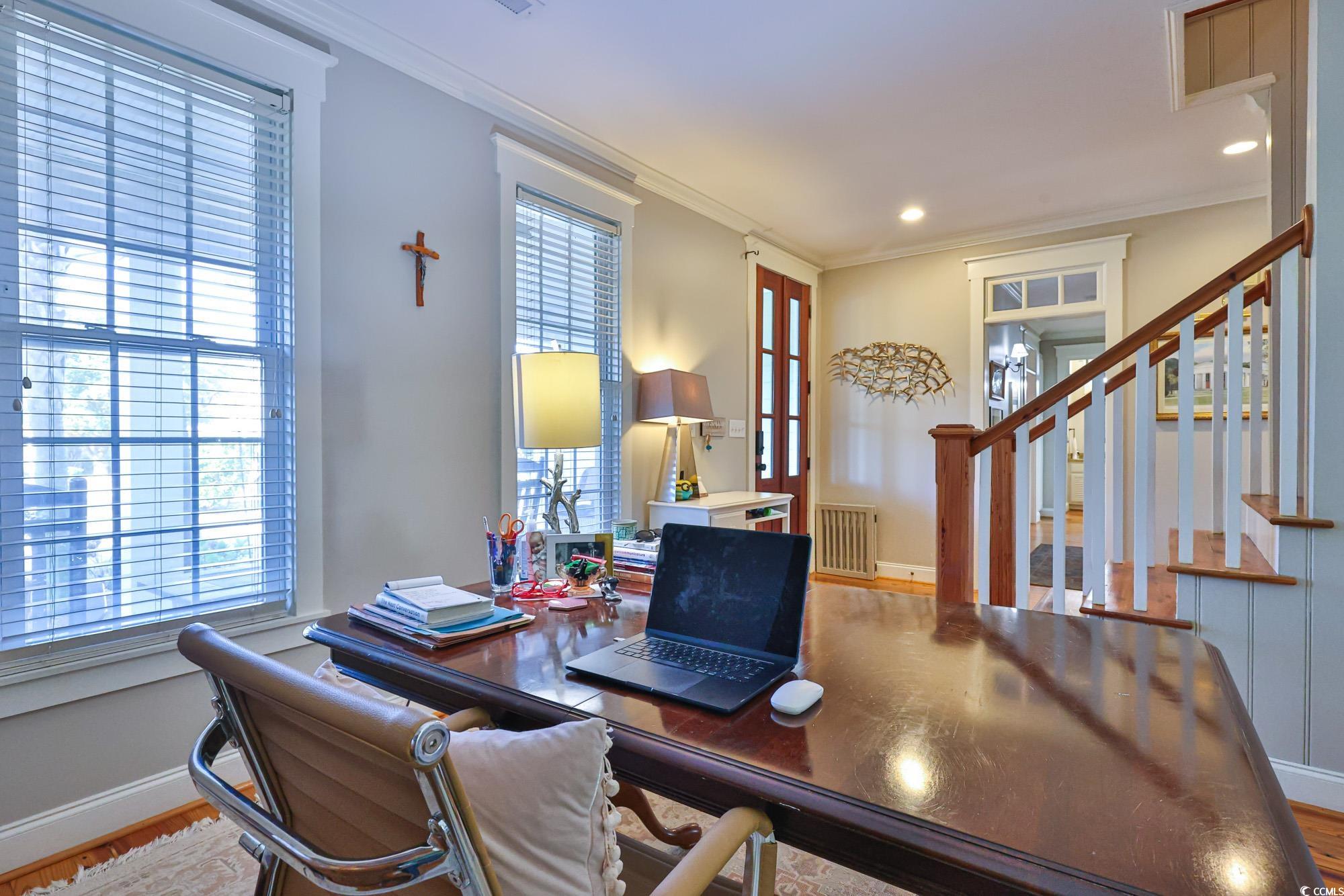 998 Shipmaster Avenue Myrtle Beach, SC 29579 - Photo 21 of 40 Office area featuring crown molding, plenty of natural light, radiator heating unit, wood finished floors, and recessed lighting