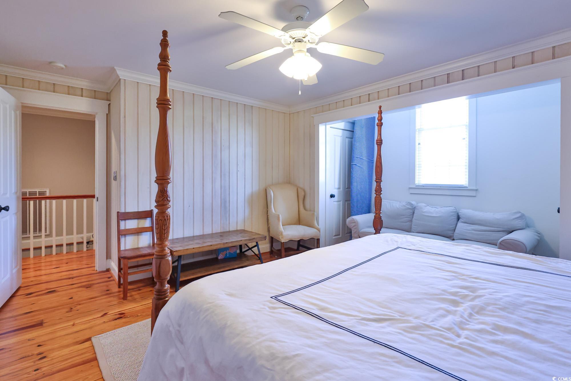 998 Shipmaster Avenue Myrtle Beach, SC 29579 - Photo 27 of 40 Bedroom with crown molding, light wood-style floors, and ceiling fan