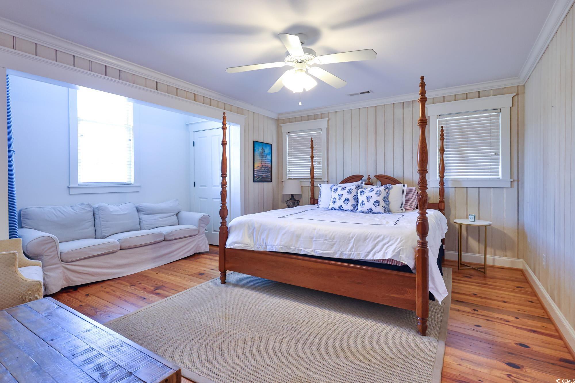 998 Shipmaster Avenue Myrtle Beach, SC 29579 - Photo 28 of 40 Bedroom featuring ornamental molding, hardwood / wood-style floors, and ceiling fan