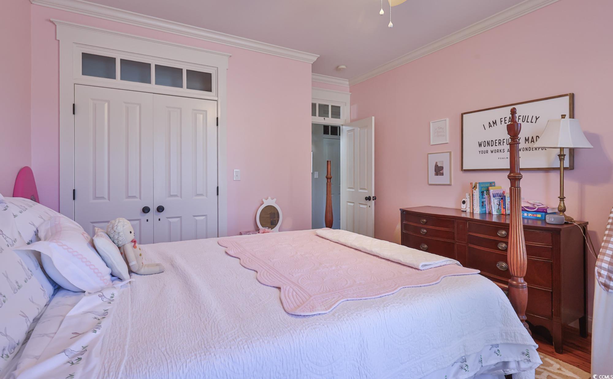 998 Shipmaster Avenue Myrtle Beach, SC 29579 - Photo 30 of 40 Bedroom featuring crown molding and a closet