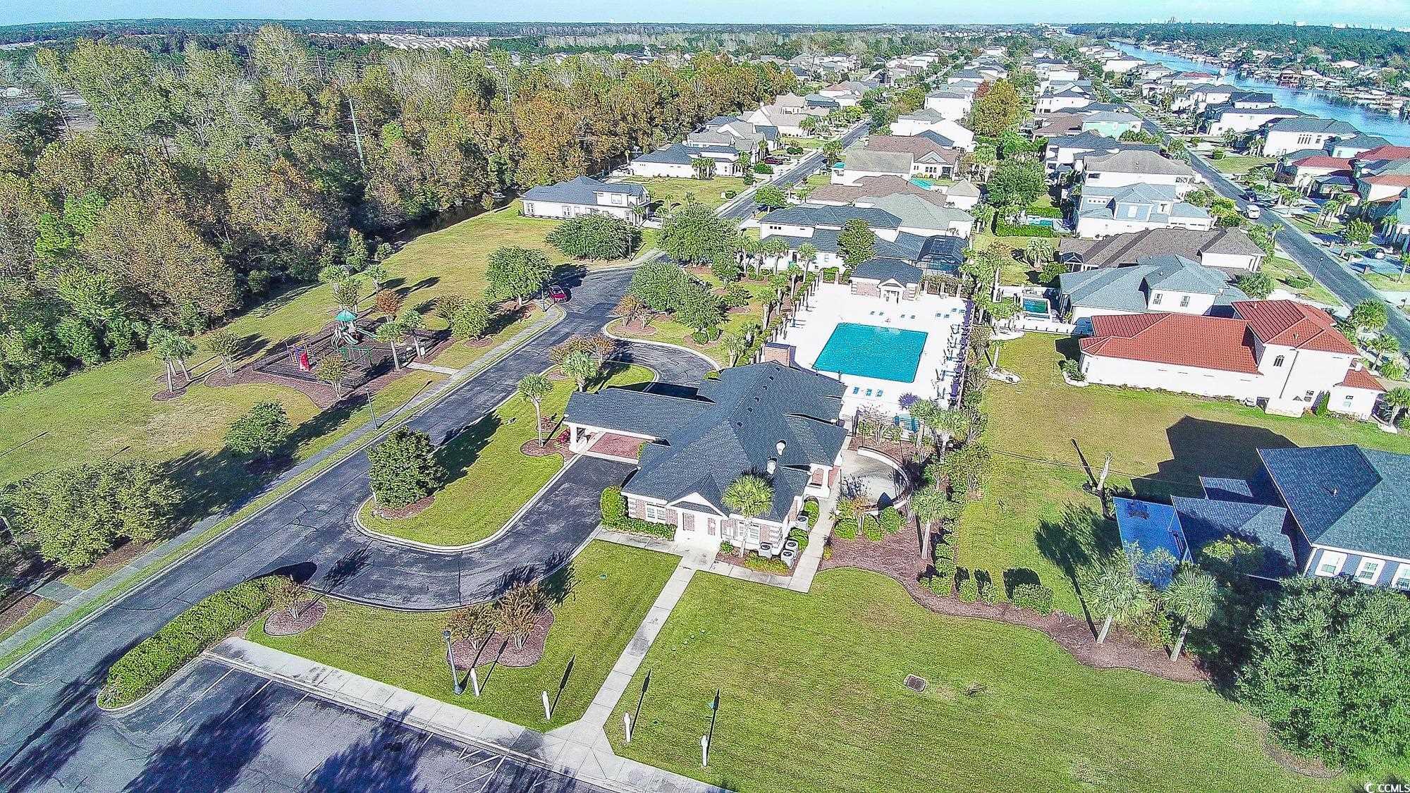 998 Shipmaster Avenue Myrtle Beach, SC 29579 - Photo 38 of 40 Aerial view of property and surrounding area featuring a pool and nearby suburban area