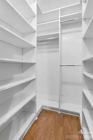 a view of an empty walk in closet