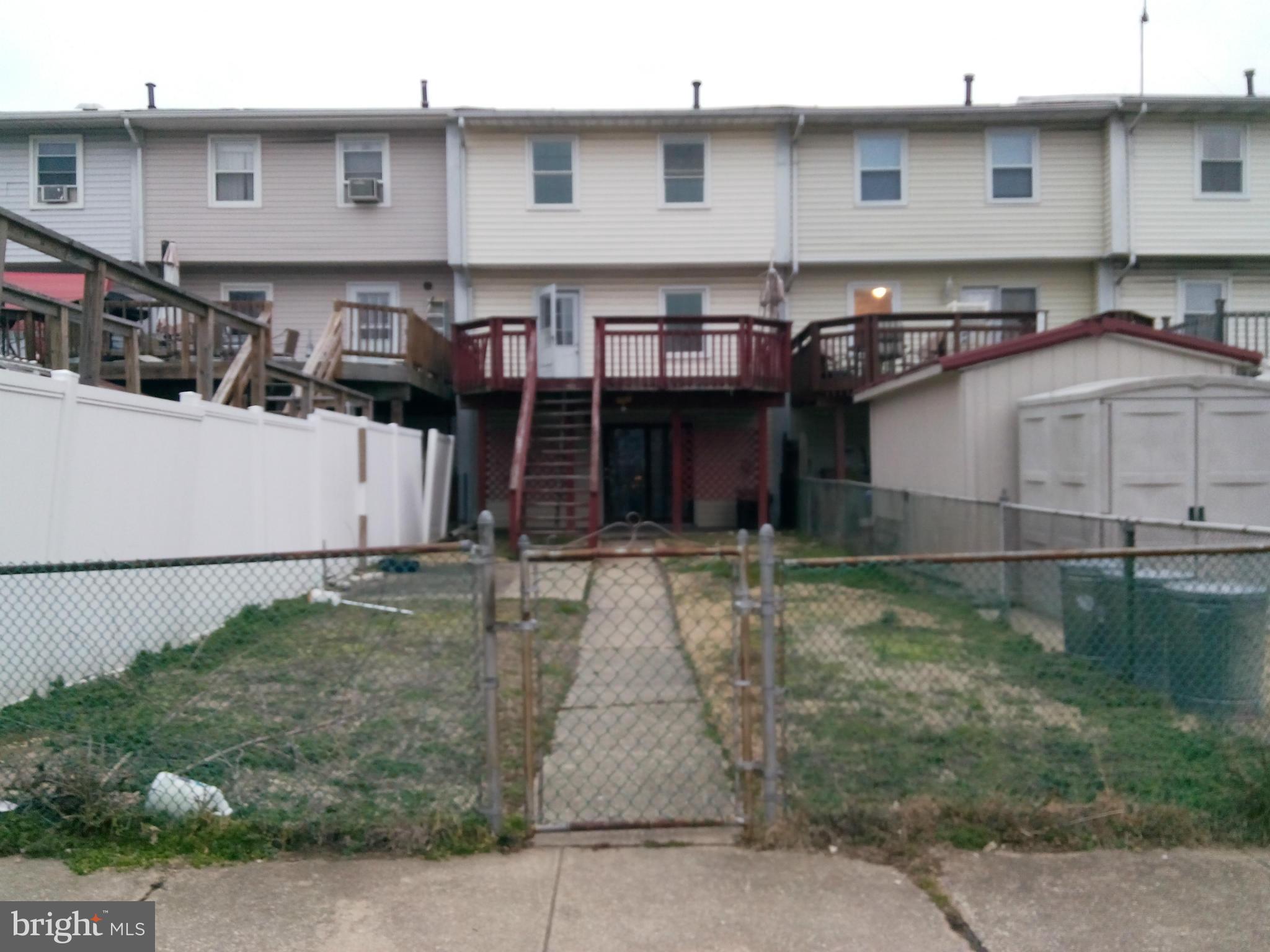 7921 Lynch Road Baltimore, MD 21222 - Photo 20 of 21 a view of a house with backyard