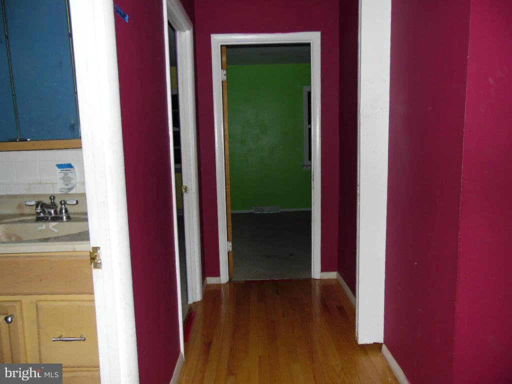 7921 Lynch Road Baltimore, MD 21222 - Photo 9 of 21 a view of a hallway
