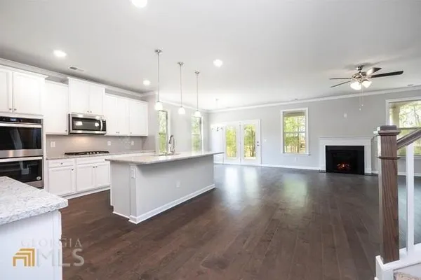 a large kitchen with cabinets