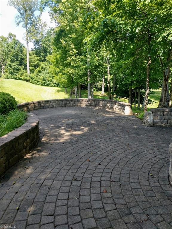 7933 Tranquility Place Oak Ridge, NC 27310 - Photo 4 of 4 Firepit area