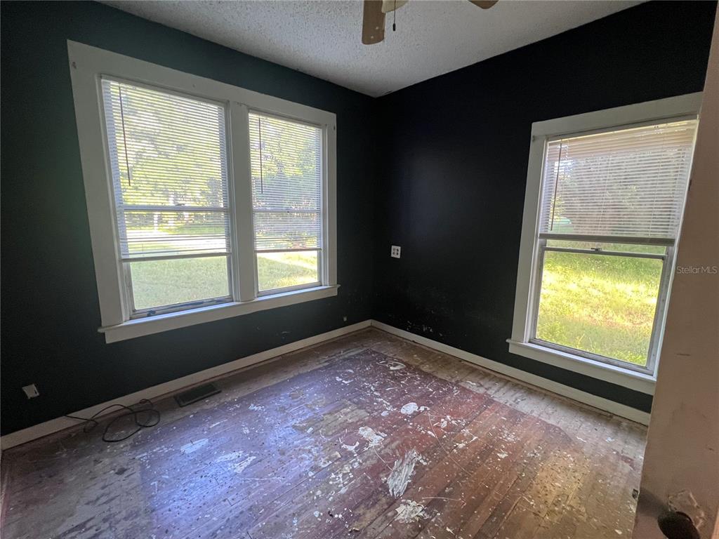 177 East 3rd Avenue Pierson, FL 32180 - Photo 10 of 16 a view of an empty room and window