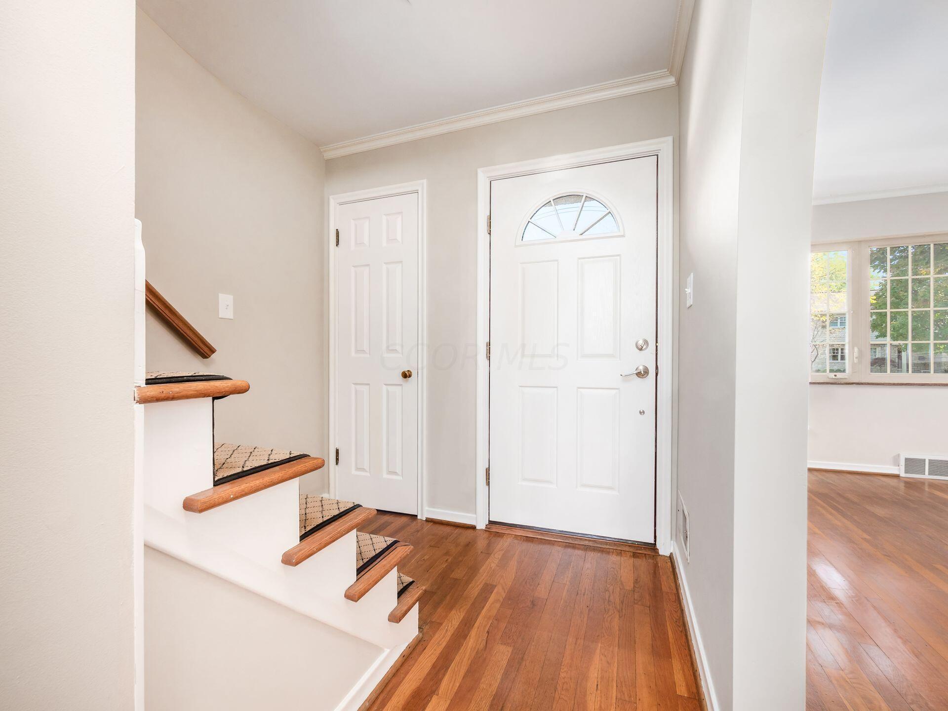 2027 Edgemont Road North Columbus, OH 43212 - Photo 7 of 40 Front Door with Front Coat Closet and Stairs to Floor 2