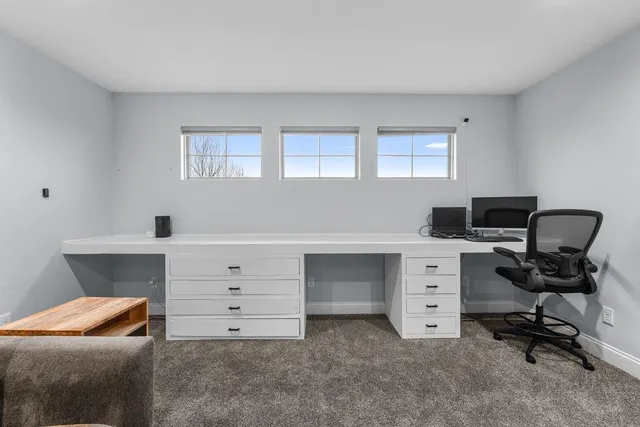 a view of workspace with lounge chair