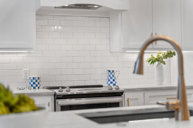 a bathroom with a sink and a window