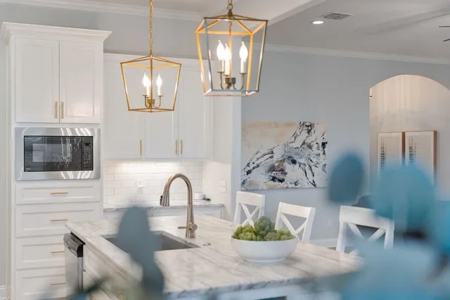 a view of a kitchen area with furniture
