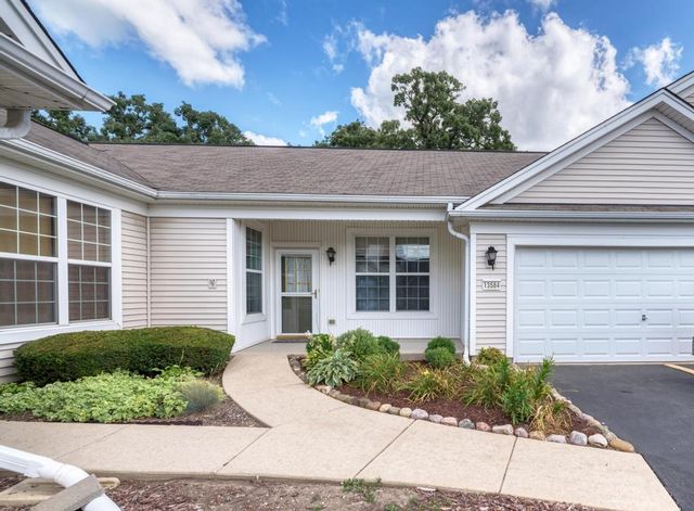 a view of a house with a garage