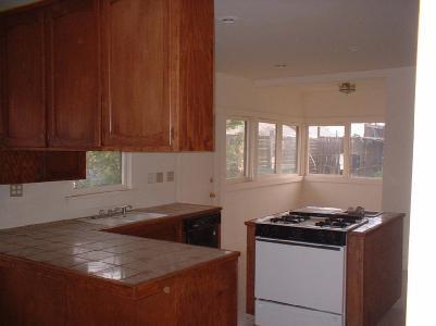 33059 Hawthorne Road Ivanhoe, CA 93235 - Photo 2 of 4 LARGE KITCHEN WITH NEW STOVE AND VINYL.